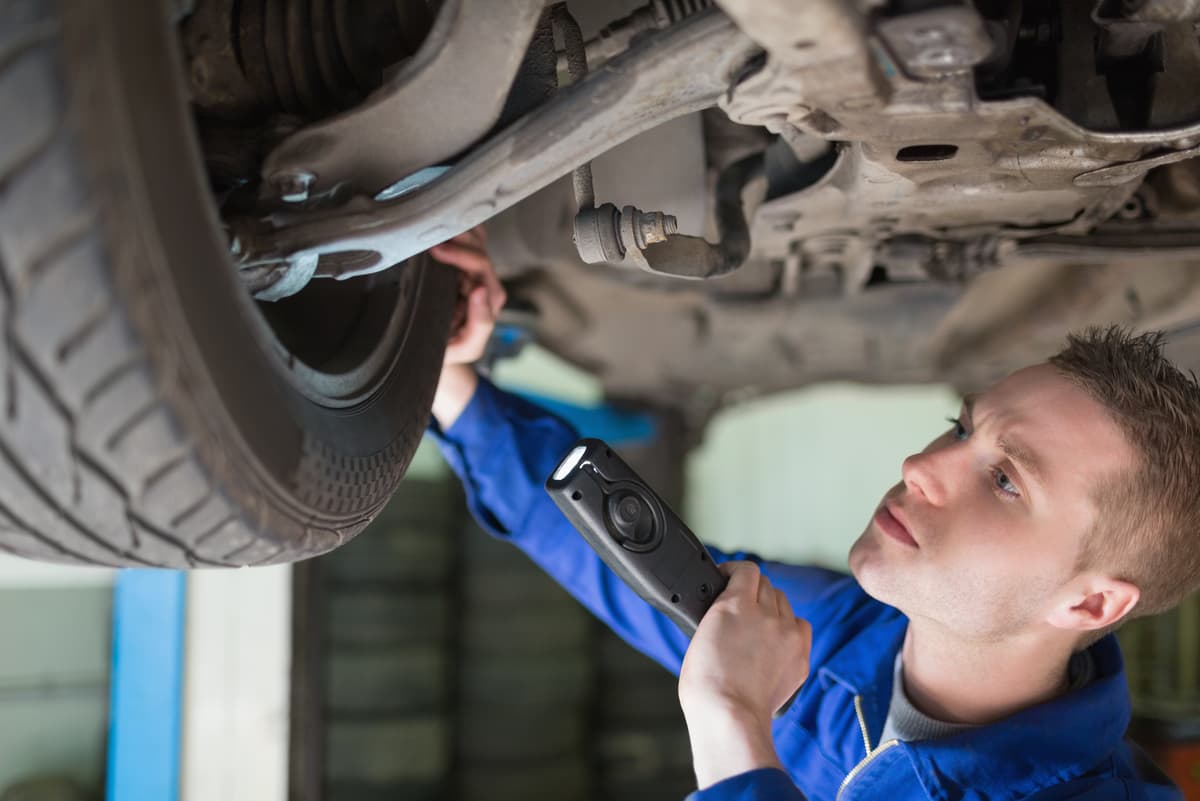 Mechanic working on a car
